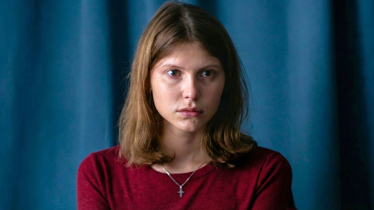Devout college student suffers strange seizures and begins to see why her parents fear her desires