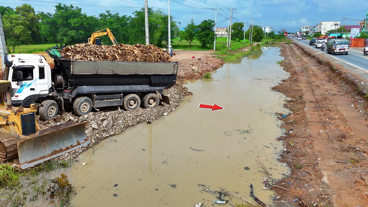 Be Watchful!. New Landfill Task! Dump Truck 25Ton Pouring soil across canal & Dozer Pushing Stone