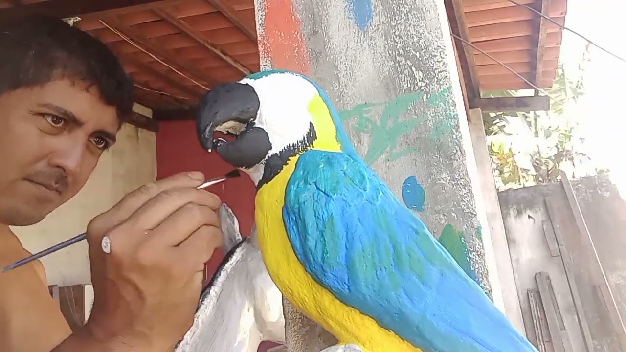 PINTURA DA ARARA CANIDÉ DE CIMENTO