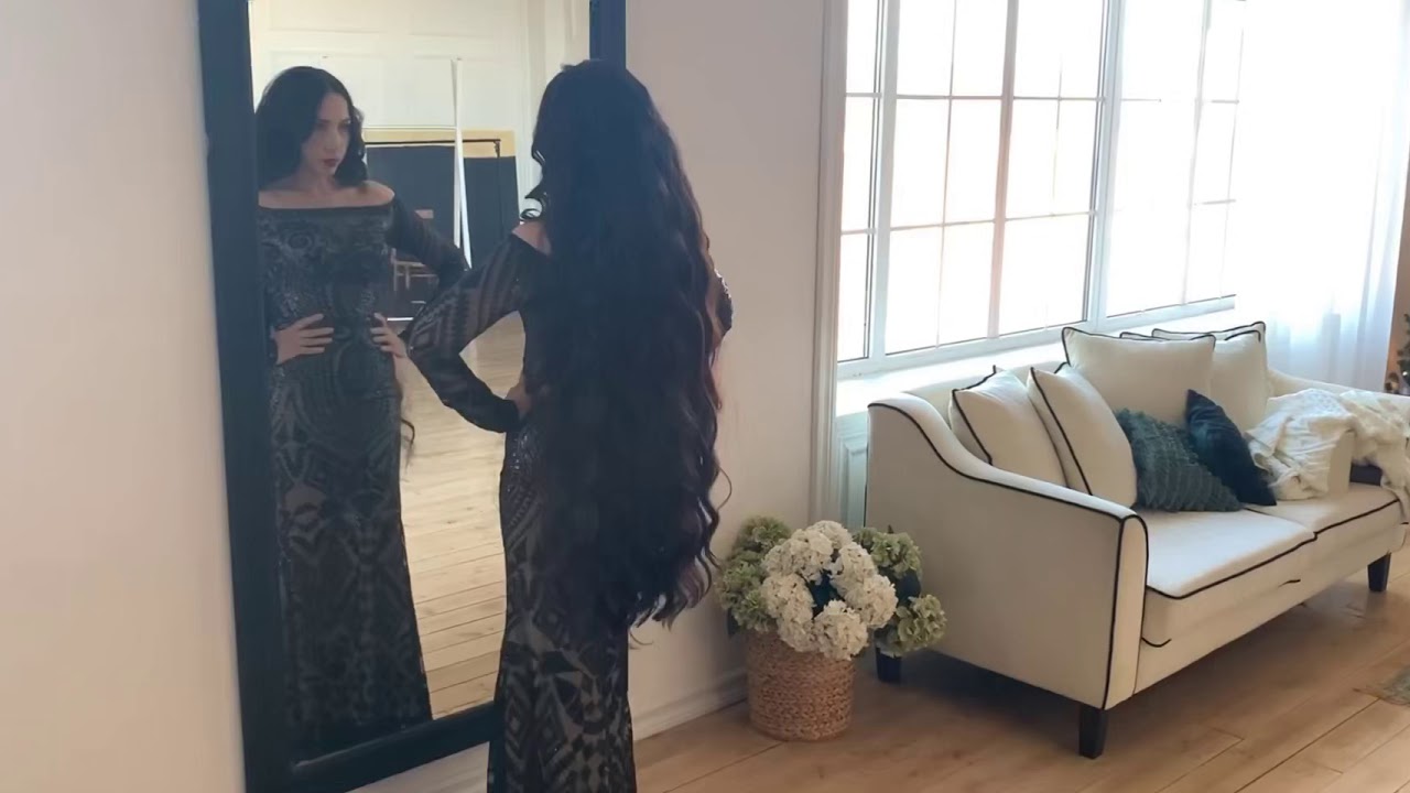 Hair model Mila. Backstage shooting curly long hair.