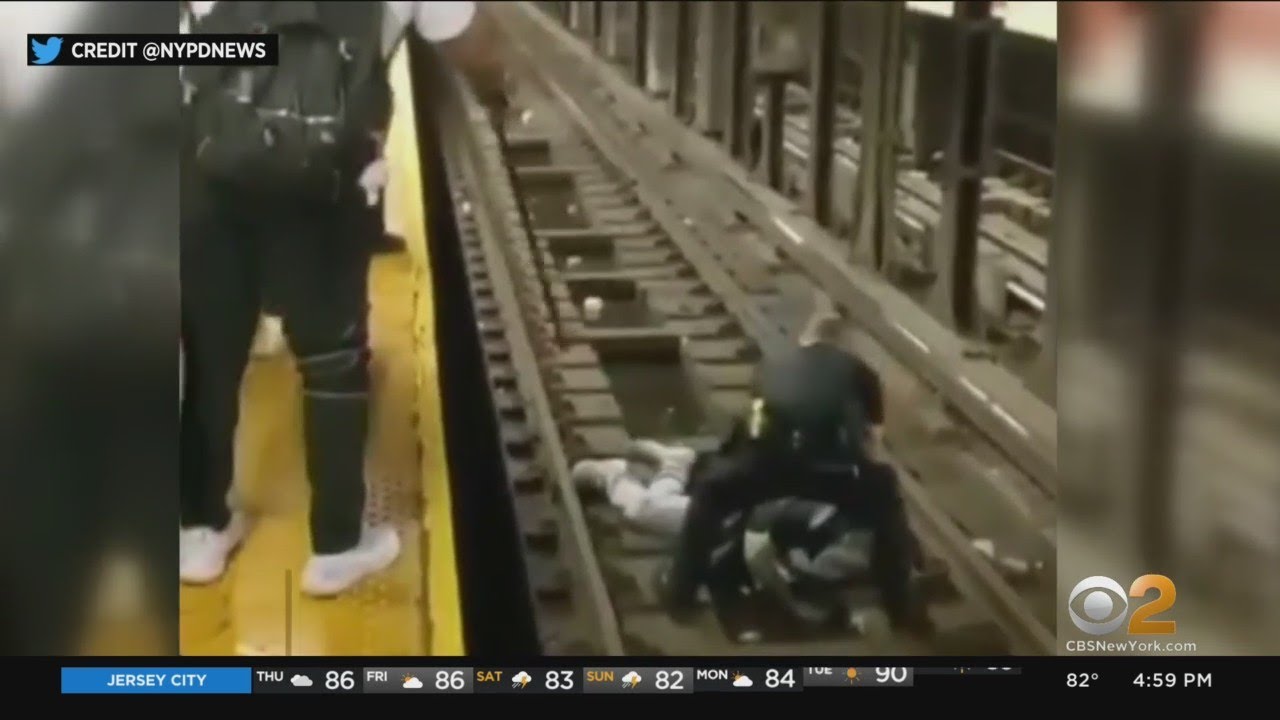 Video Shows NYPD Officer, Good Samaritan Rescuing Man From Subway Tracks
