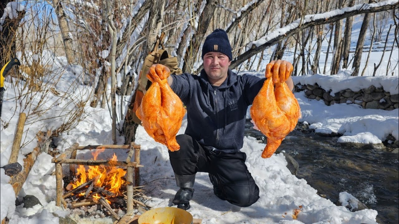 Fried chicken cooked in the heart of nature, prepared over an open fire in fresh air  delicious and