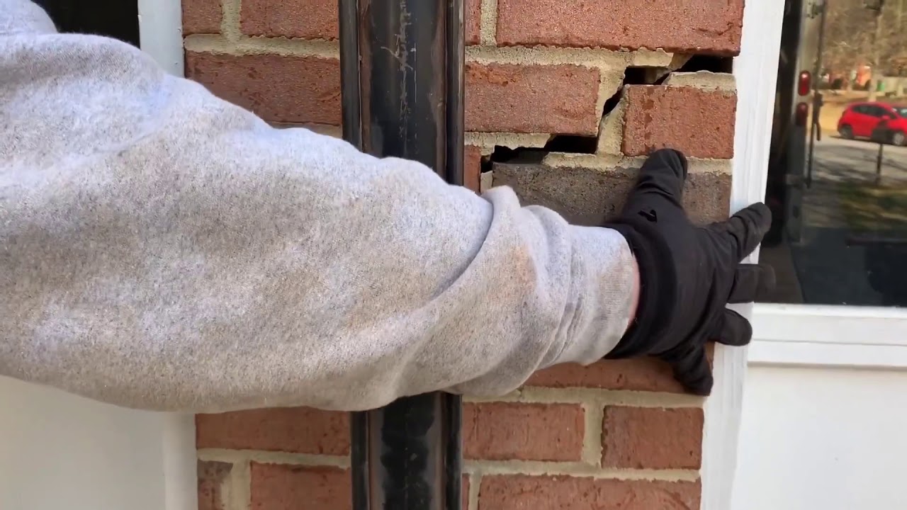 JSA Foundation Repair “How to lift a settling brick foundation wall pulling away and sinking.”