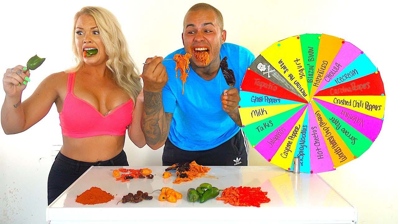 Mystery Wheel of WORLD'S HOTTEST PEPPERS Challenge! * GHOST PEPPERS * CAROLINA REAPERS * HOT CHEETOS