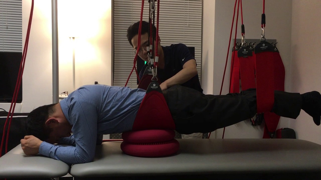 sling exercise (red cord exercsies) at core station physical therapy