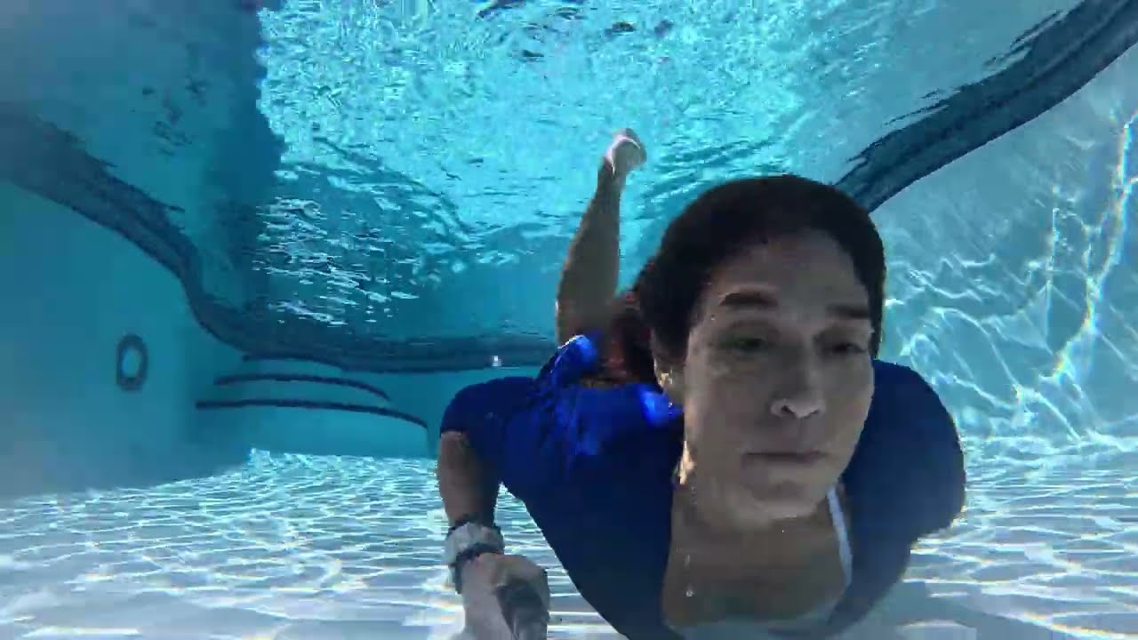 SWIMMING Underwater Clothed in The Little Blue Dress and Tall Boots