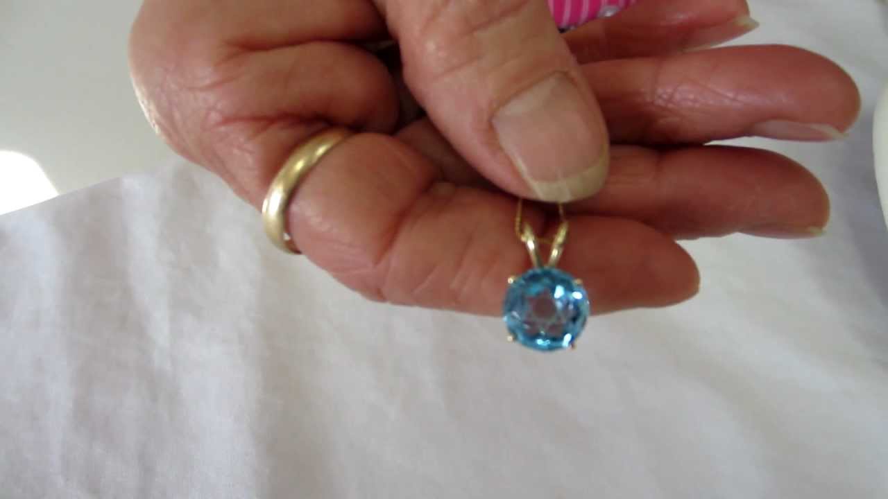 Jewish Jewelry Blue Topaz Star of David set in 14K Gold Setting