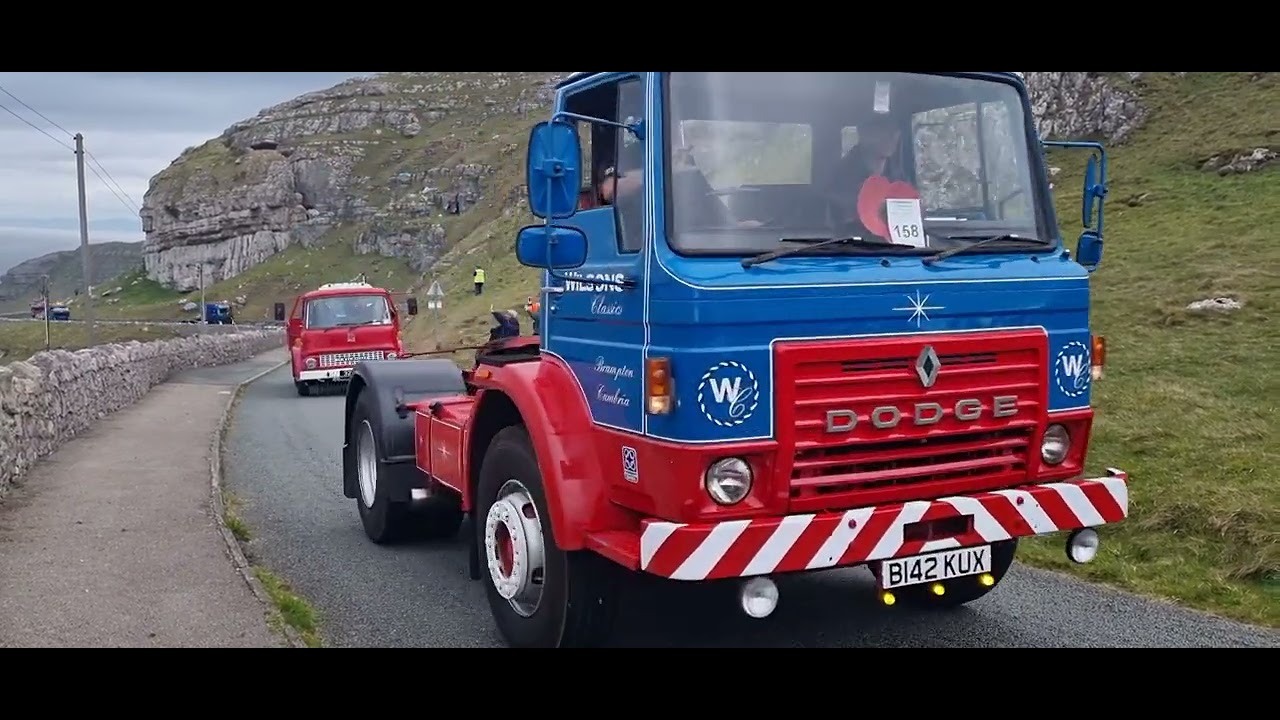 Cavalcade of old vehicles across the Great Orme in Llandudno