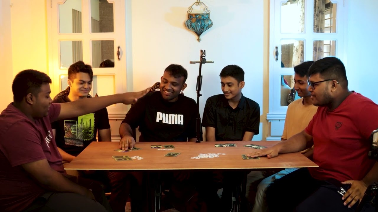 Playing Bengali board game  ( ষড়যন্ত্র ) Shorojontro with friends and family