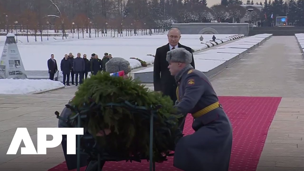 Watch Putin Pay Tribute by Laying Flowers at Leningrad War Memorial | APT