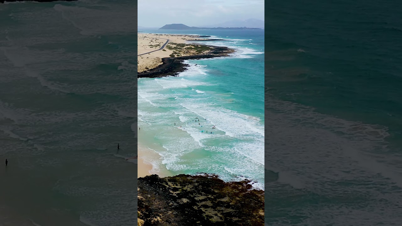 Surf en la Playa de Corralejo, Fuerteventura.