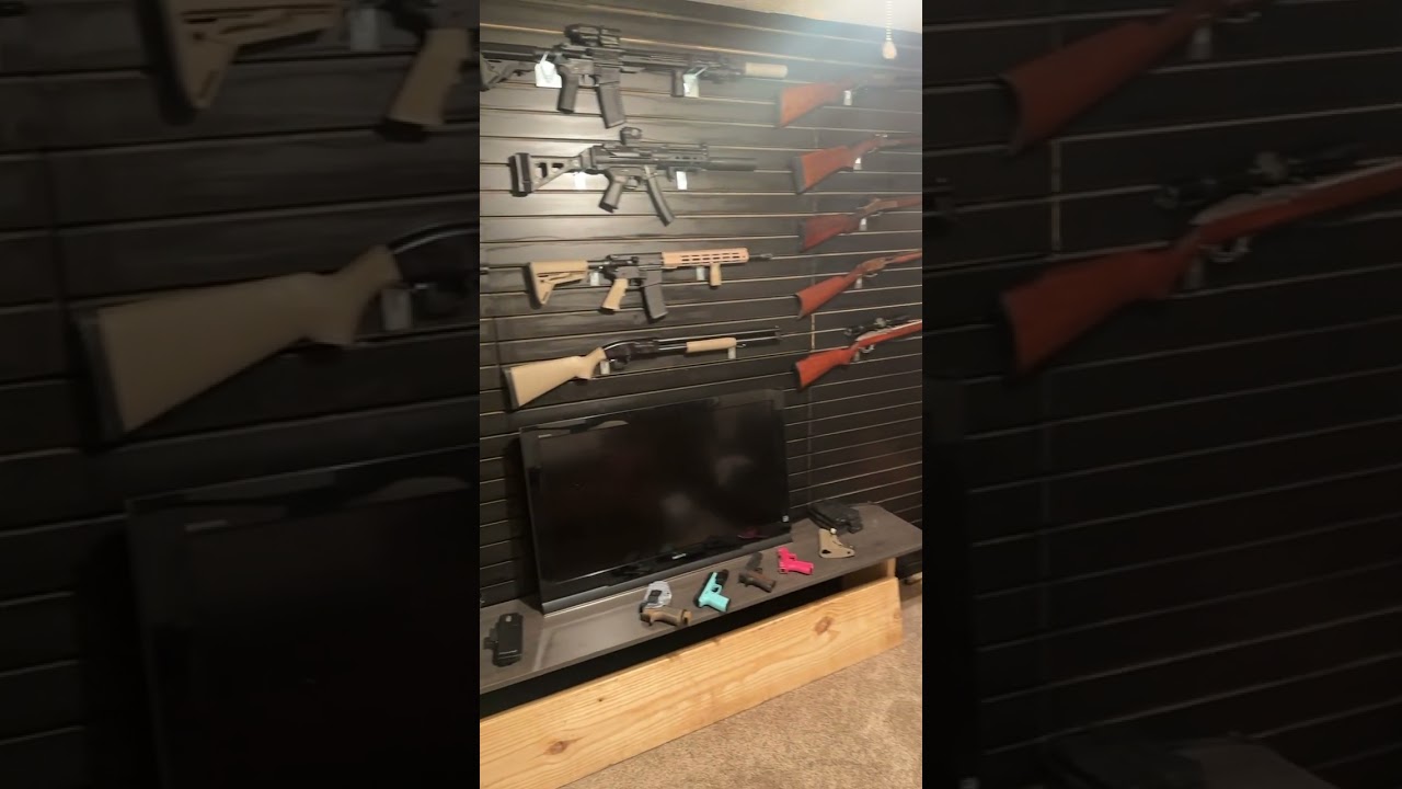 Still a lot to do. Budget DIY gun wall using slatwall 4x8 sheets. Less than 250$ #gunwall #gunroom