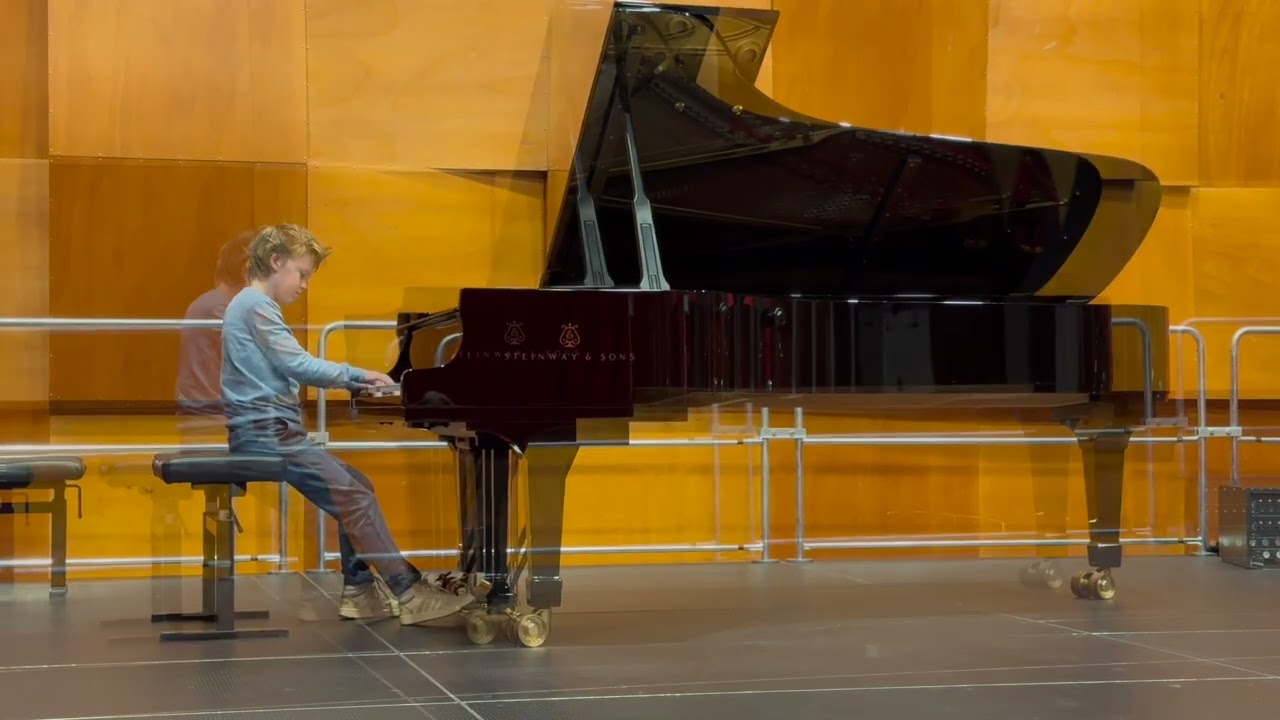 Floris (10) performs in the piano class at the classical department of The Prins Claus Conservatory.