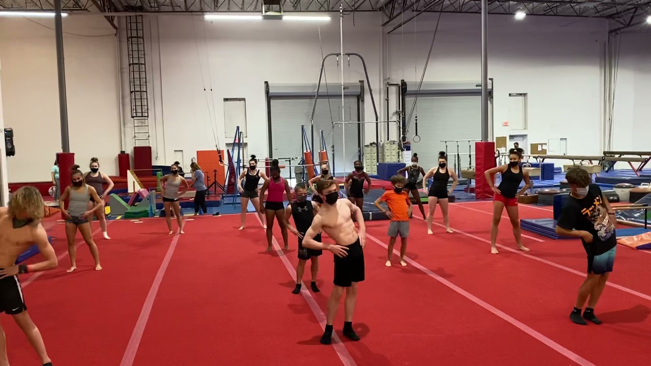 Warm up stretch led by the boys Enter the Sandman by Metallica