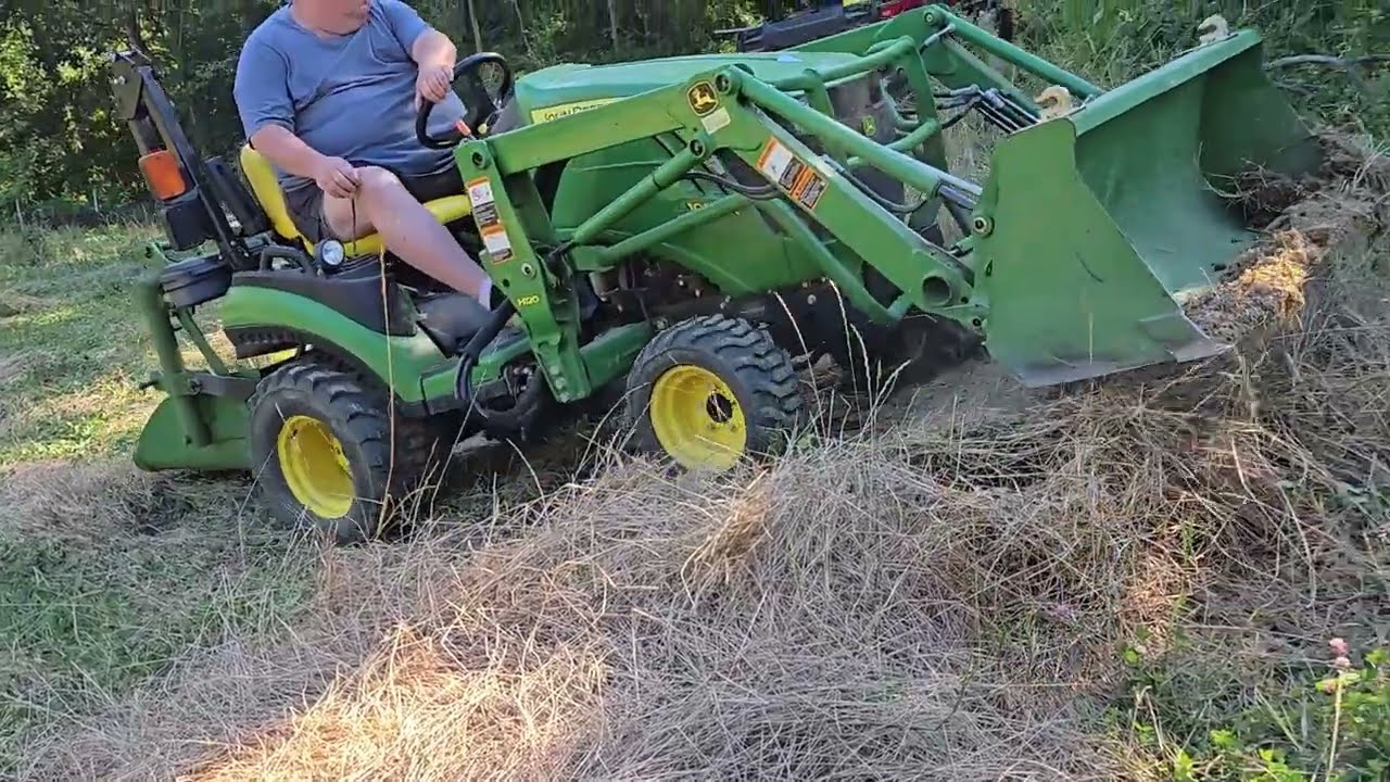 Moving Dirt and Clearing Paths with JD 1025R
