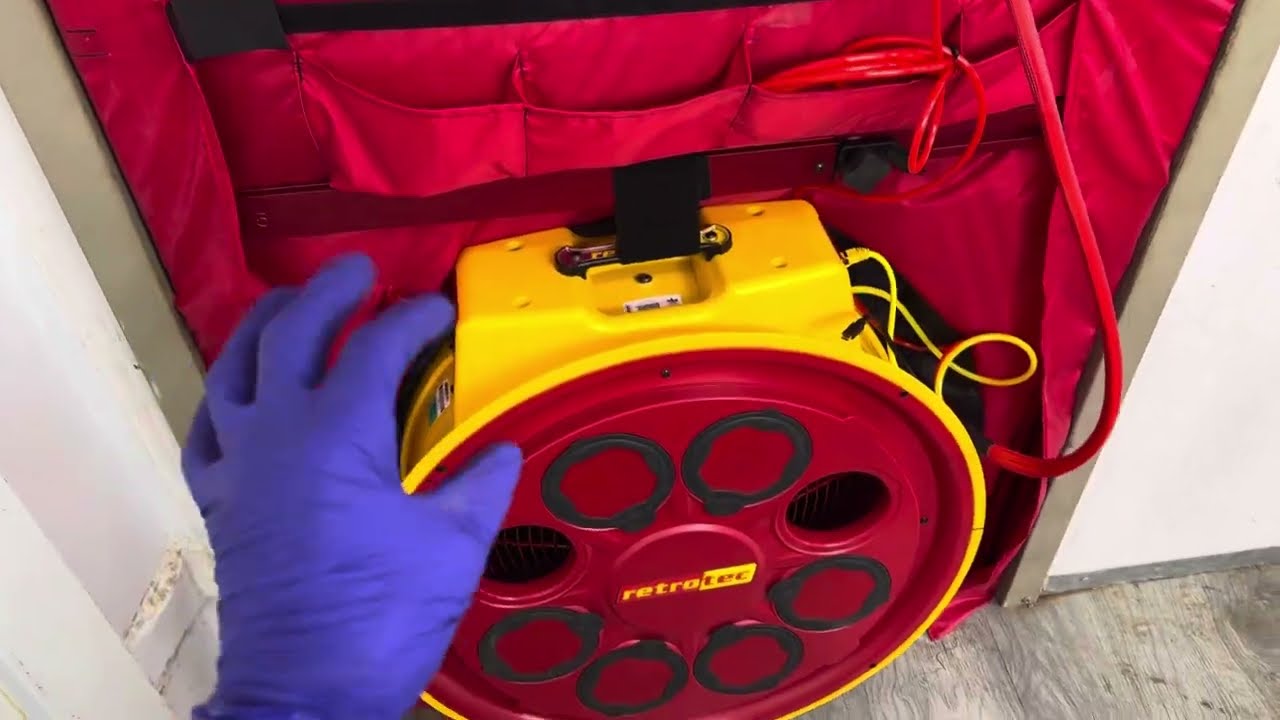 RETROTEC blower door test. When hot humid air turns into water in the electrical panel. ￼