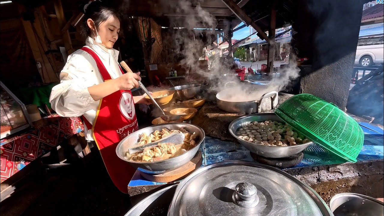 Breakfast at old traditional noodles restaurant in Pakse 
