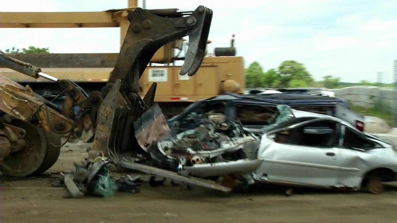 Engine Biter and Car Crusher in Junkyard