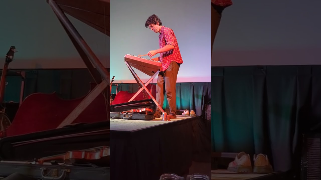 Simon Chrisman plays the hammer dulcimer, performing a piece written for solo violinist.