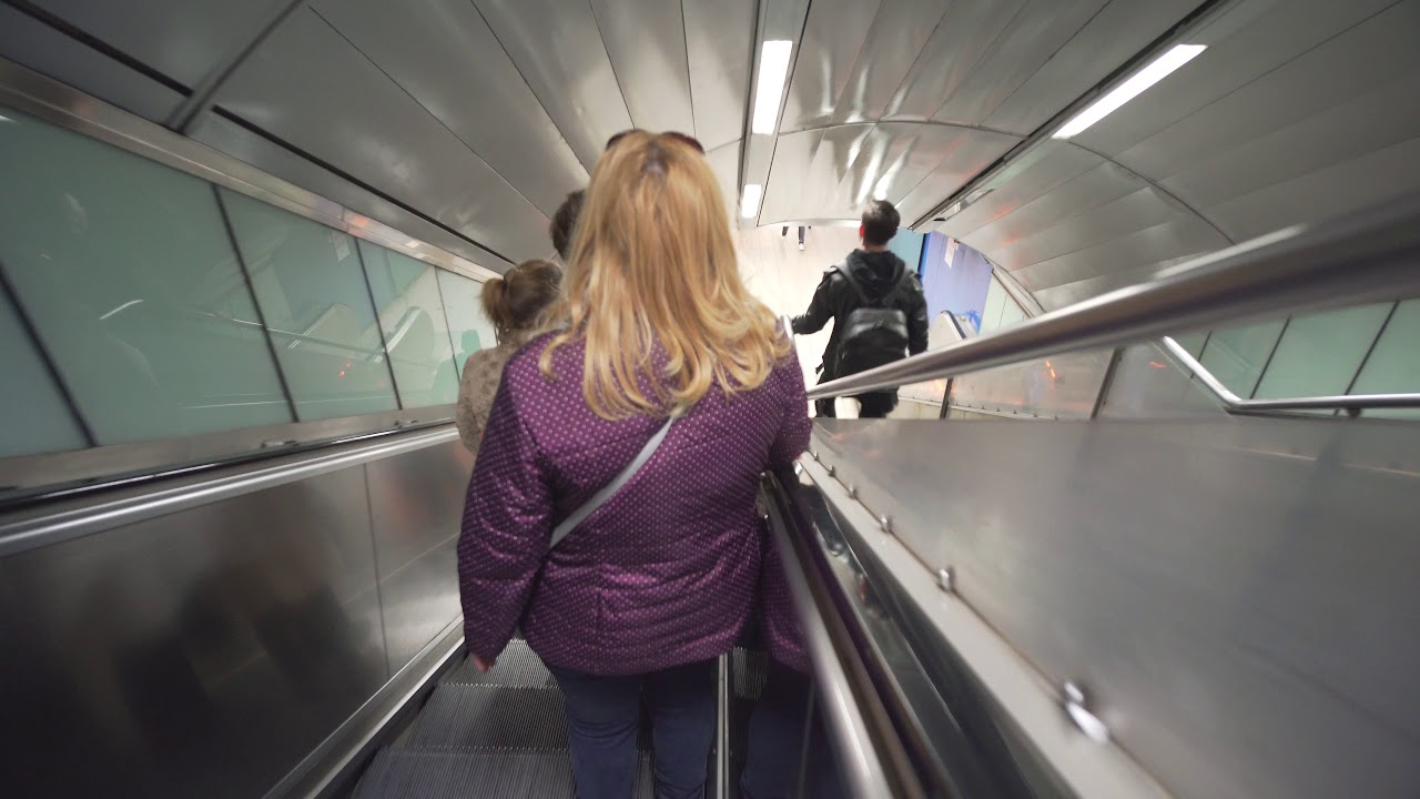 Italy, Naples, Montesanto train station. 2X escalator - going down to platform level