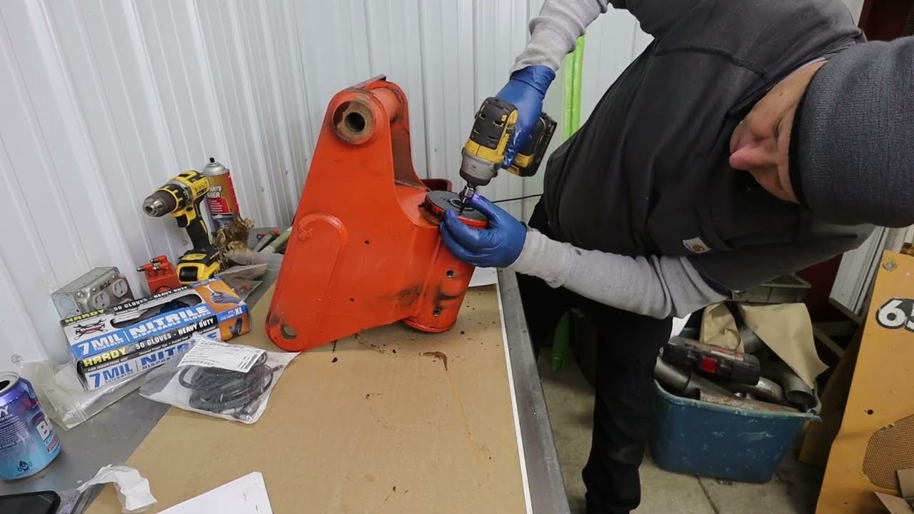 JLG 600AJ manlift basket rotator rebuild.  NOT as hard as you would think, let's do it!