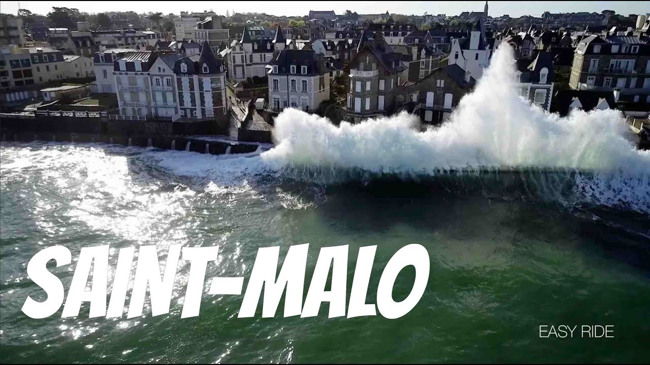 Huge storm waves slam into sea wall in Saint-Malo, France - Easy ride Op&eacute;rateur drone - 4K