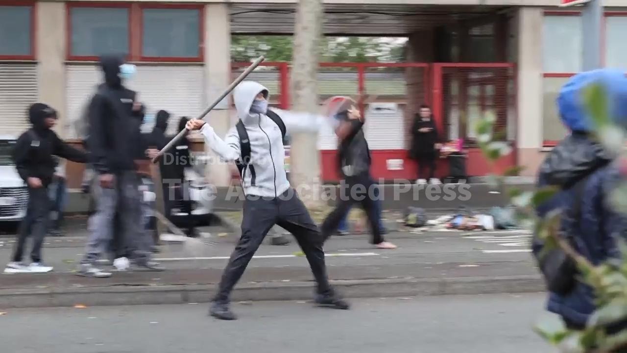Students in Lille set rubbish bins ablaze during protest over school funding