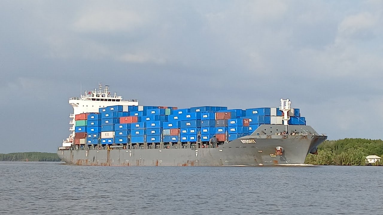 Container trains move quickly through tight turns.
