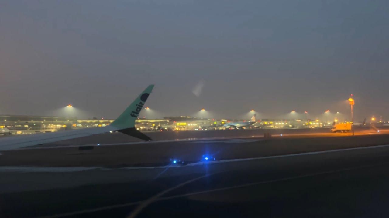 Landing at Edmonton International Airport (YEG), Alberta, Canada at night