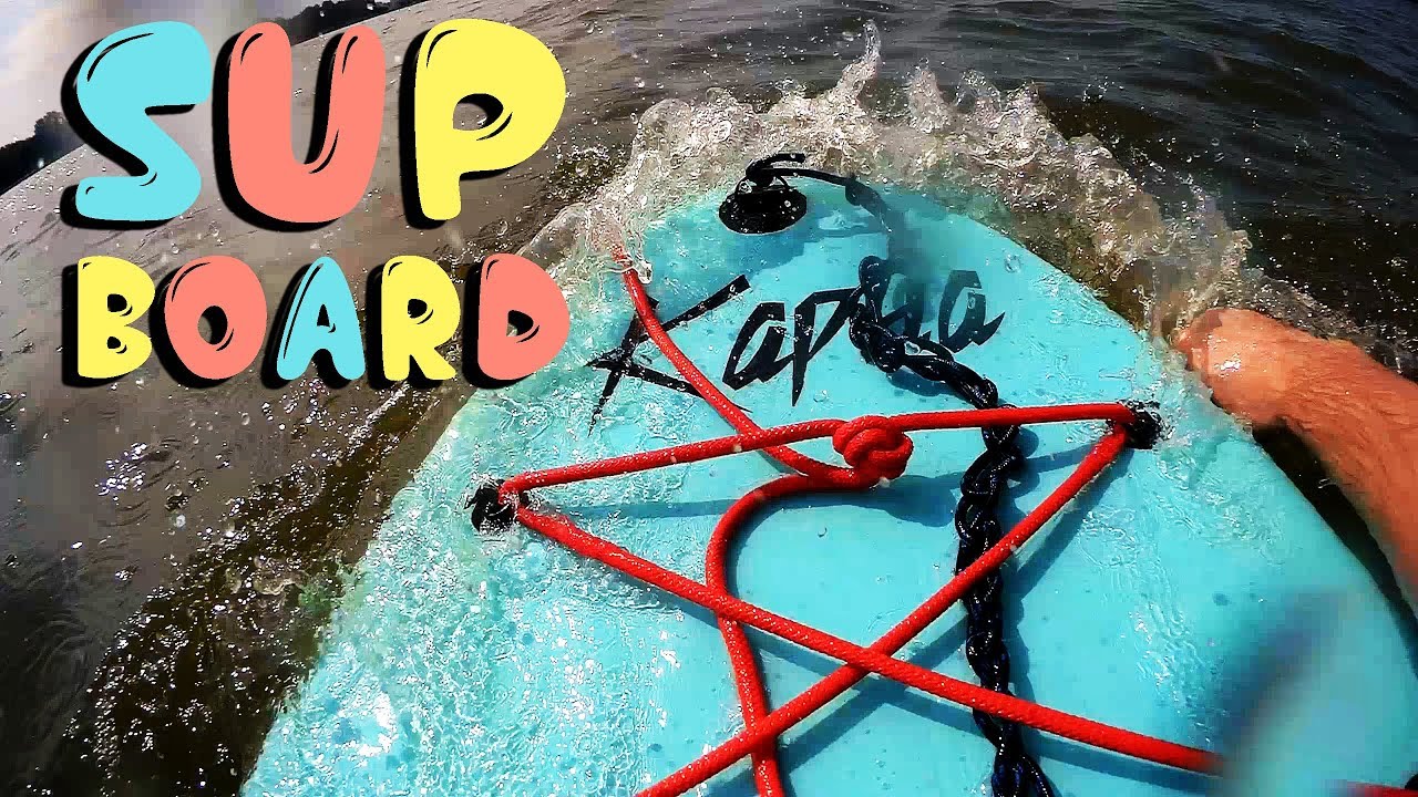 SUP board. Stand Up Paddle Board (SUP) на Чижовском водохранилище в Минске.