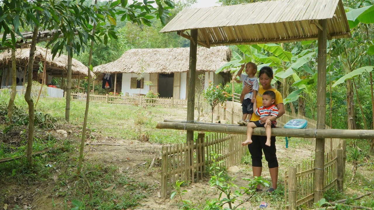Bamboo gate design for new house - single mother cooks dinner for two children.