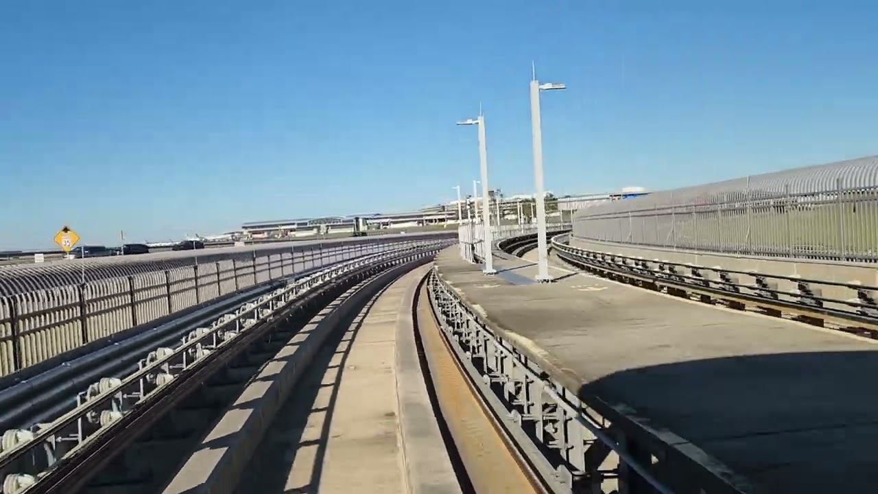 2025 - SKY CONNECT TRAIN RIDE  rear view Terminal to Economy Parking at Tampa International Airport 