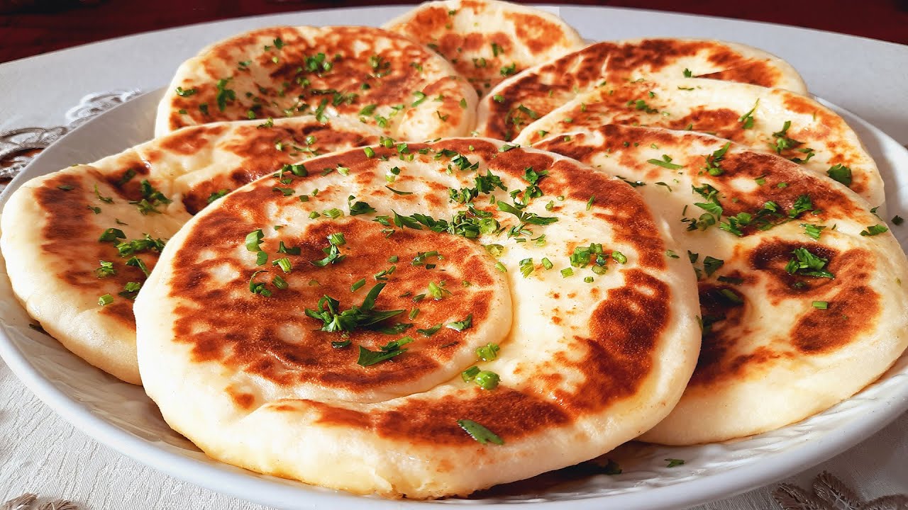 خبز النان الهندي الرائع 😋🤤 محشي بالجبن بدون فرن اخف واحسن من السفنج