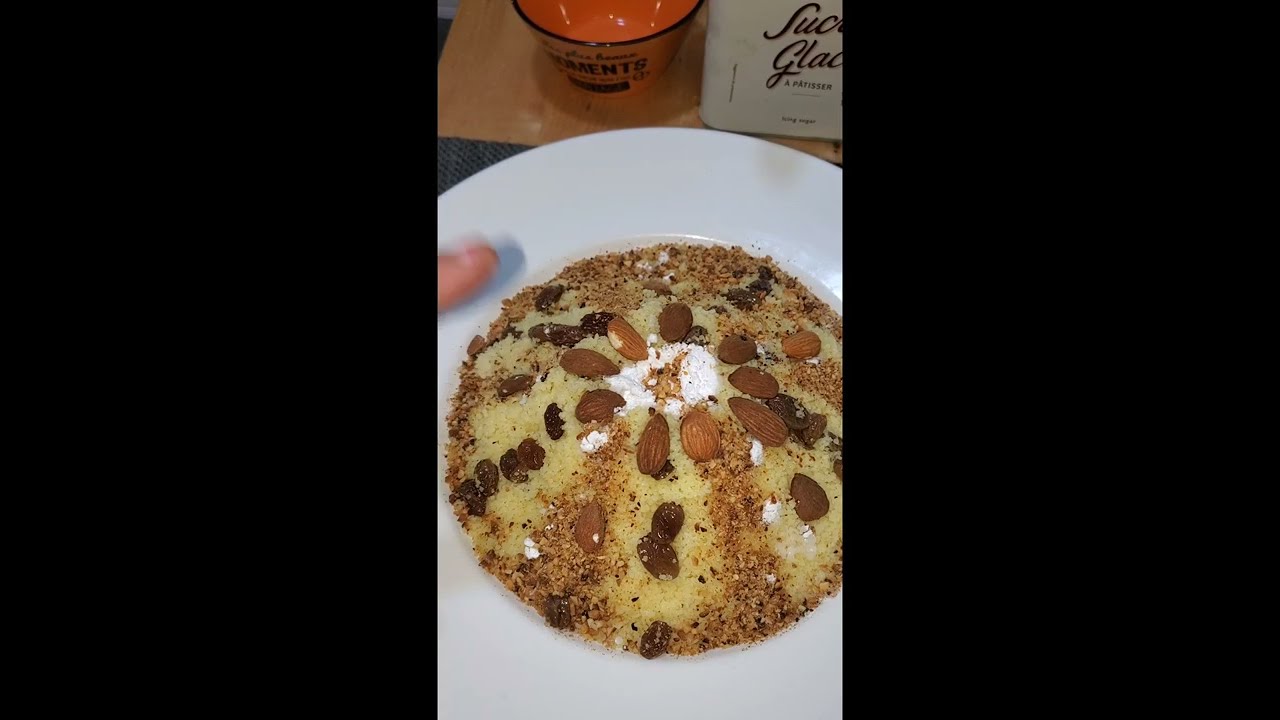couscous aux raisins sec, 🇩🇿 amande et sucre glace.😍👌👌👌👌