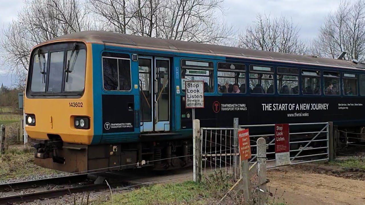 TfW Class 143 'Pacer' 143602 at Castor Level Crossing (NVR)