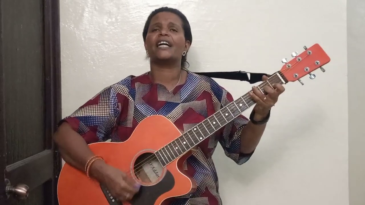 ከእኛ ጋር የያለው ከሁሉም የይበልጣል (በነፃነት ኃይሌ ሚሚ)