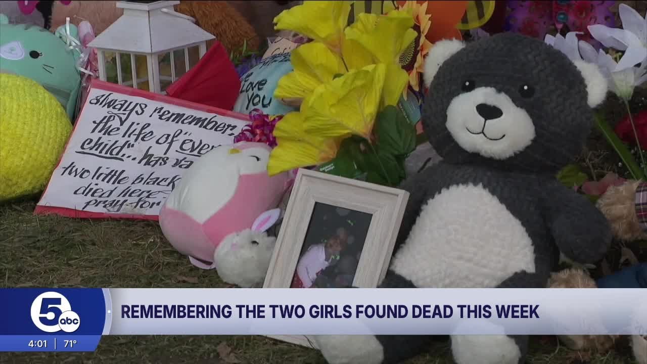 Community gathers for vigil honoring 2 young sisters found dead in Cleveland
