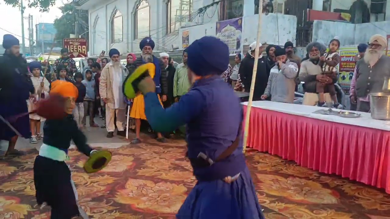 Father son duo playing gatka #gatka #khalsa #nihung 