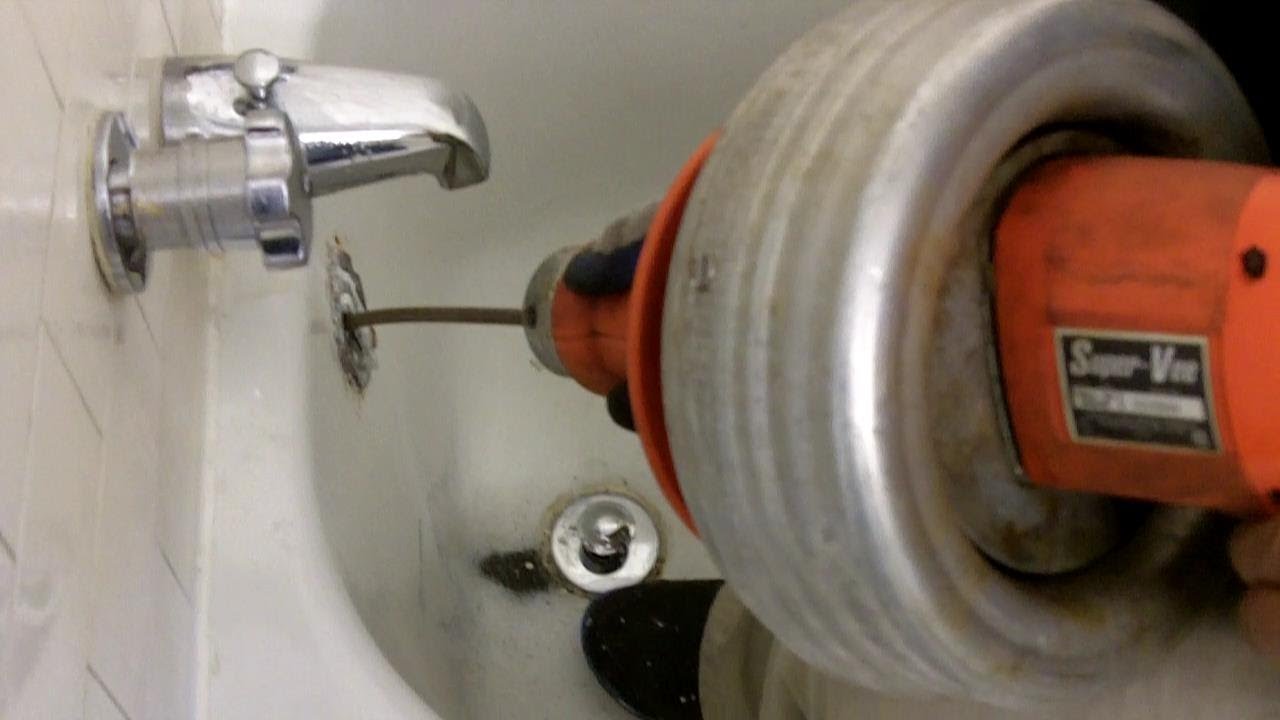 How to Snake Bathtub Drain through Overflow with Electric Auger