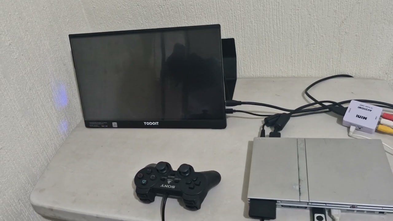 Ps2 gris  liberado com 25 juegos