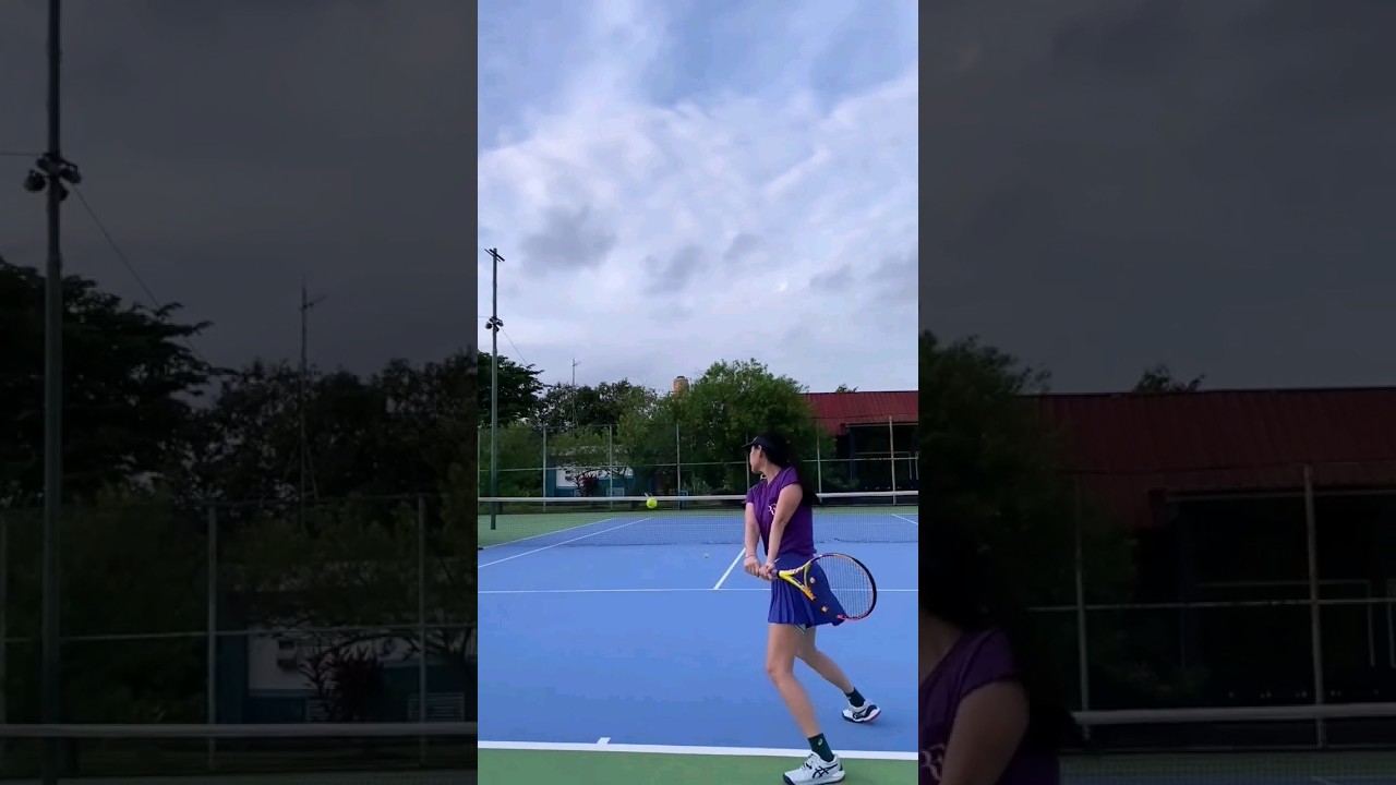 Gege Elisa Playing Tennis