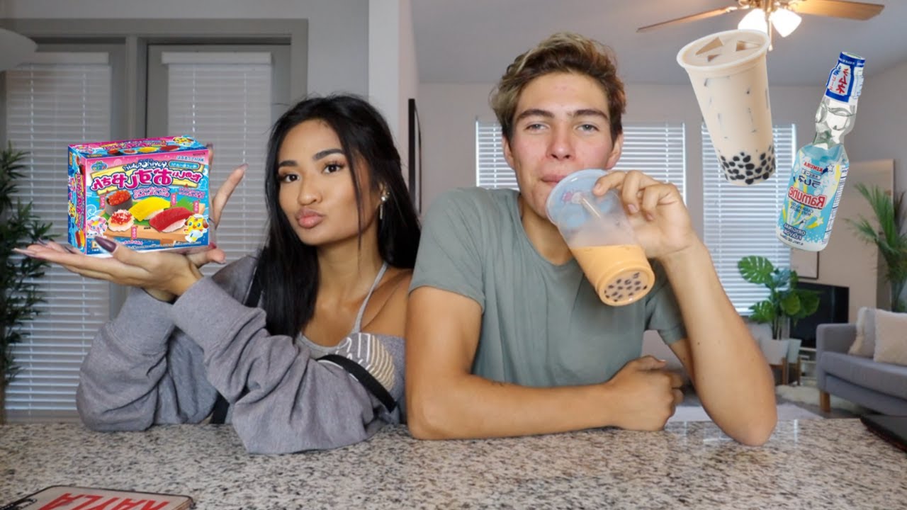 WHITE BOYFRIEND TRIES ASIAN SNACKS!!!!!