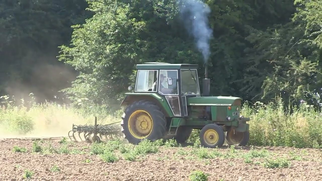 JOHN DEERE 3130 AND CULTIVATOR