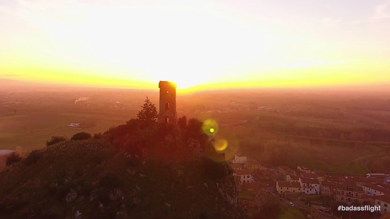 Drone shot of a beautiful tower Upezzinghi in Italy