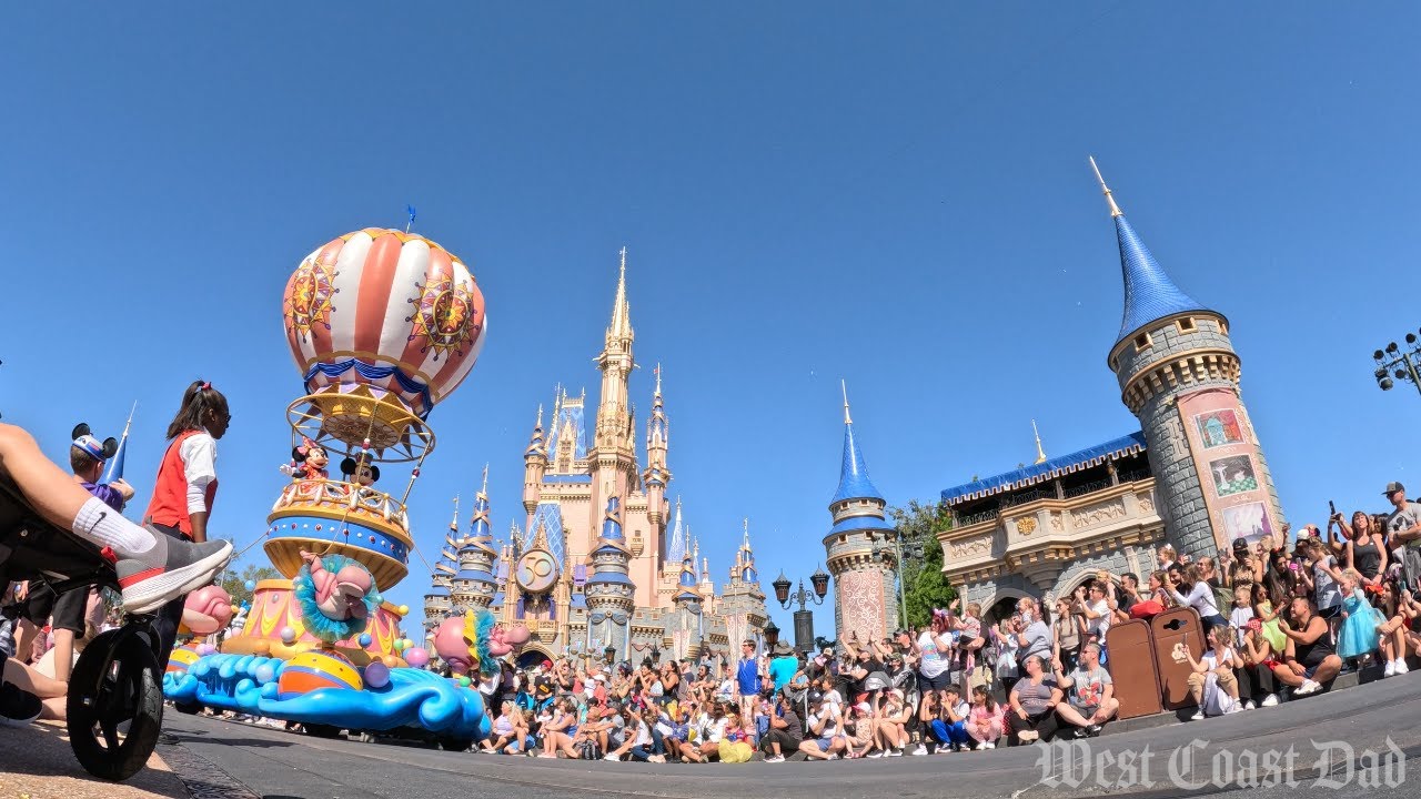 Enchanting Views: Festival of Fantasy Parade at Magic Kingdom with Cinderella's Castle Backdrop