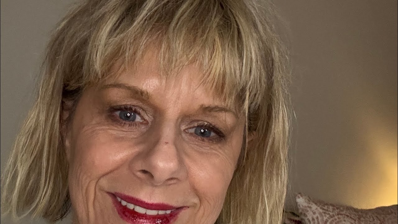 a simple no makeup look with a punch of lip color.