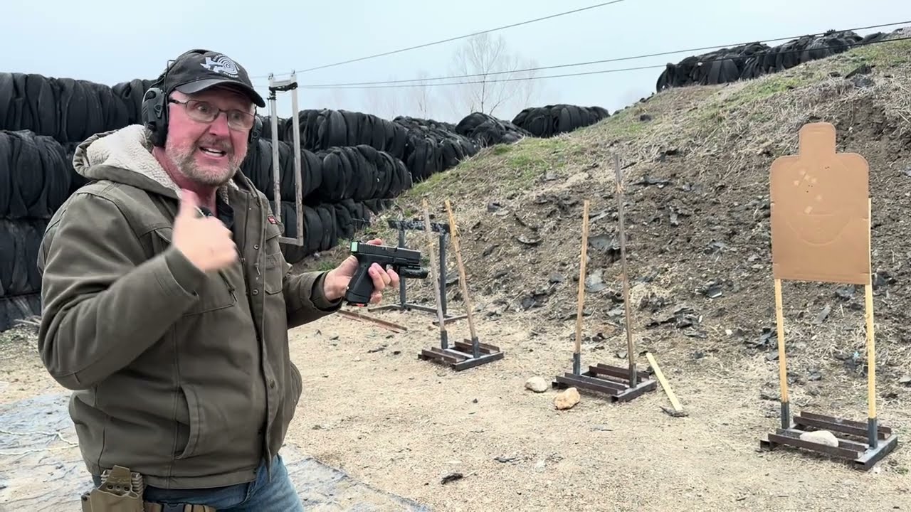 IDPA champion shooting with Green Light Sights