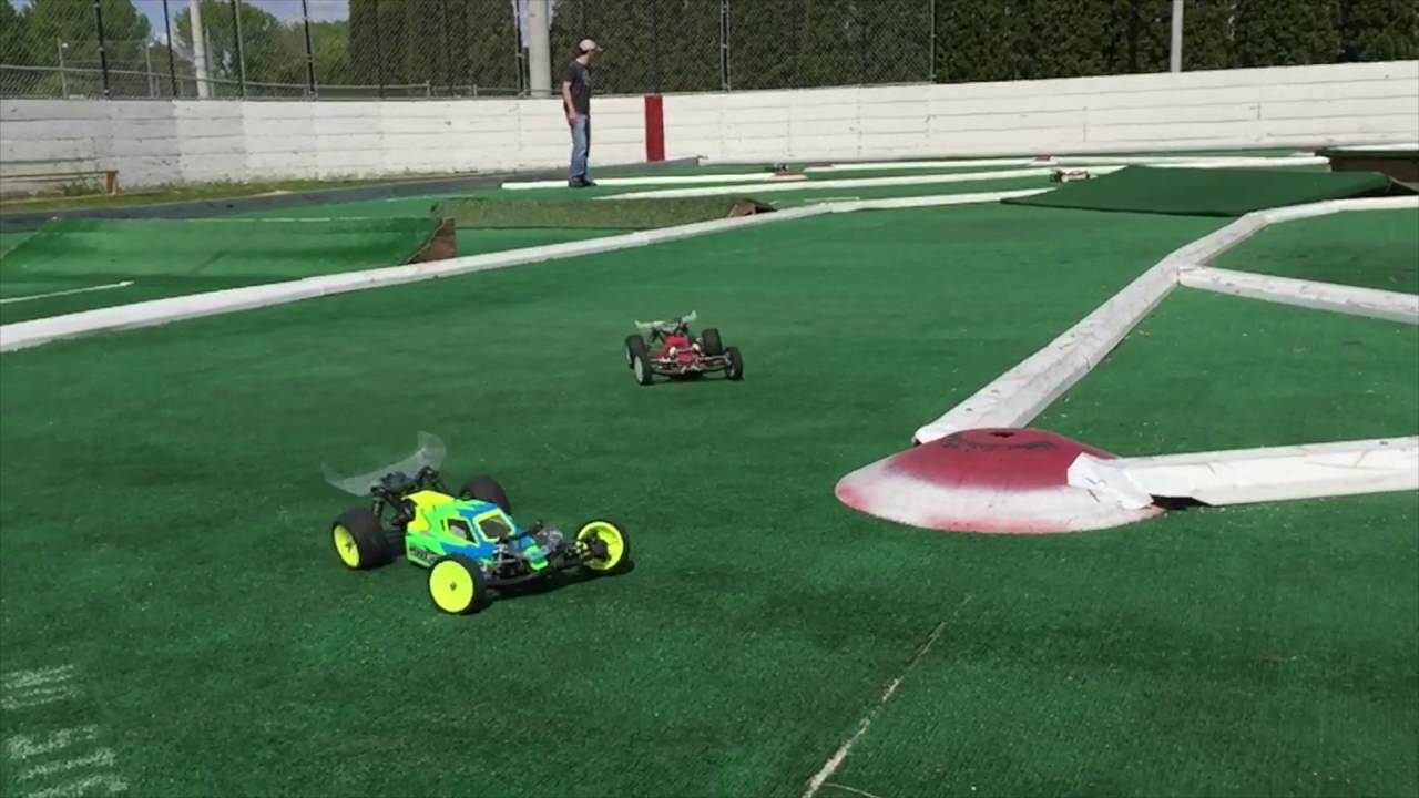Slow motion off road rc car racing on artificial grass