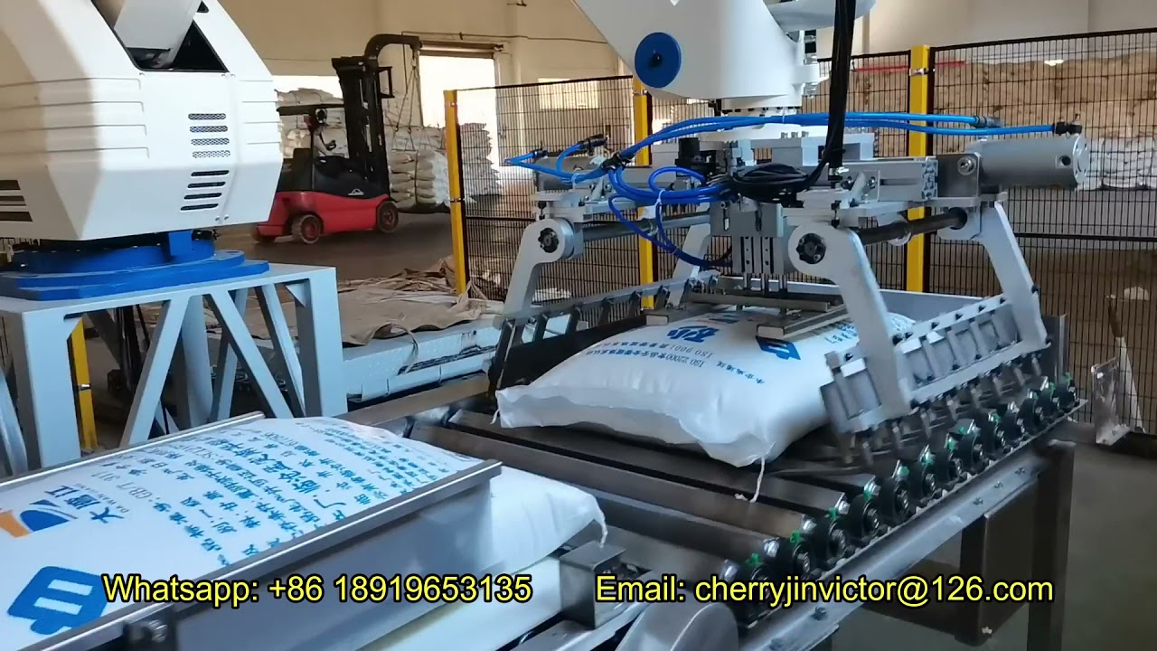 Automatic rice packaging machine and robot palletizer line