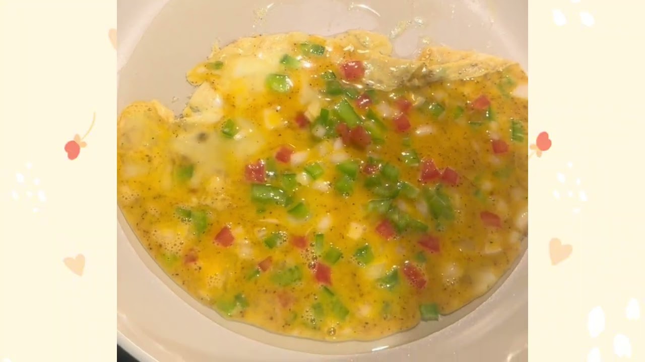 Making an omelette with sausages,￼